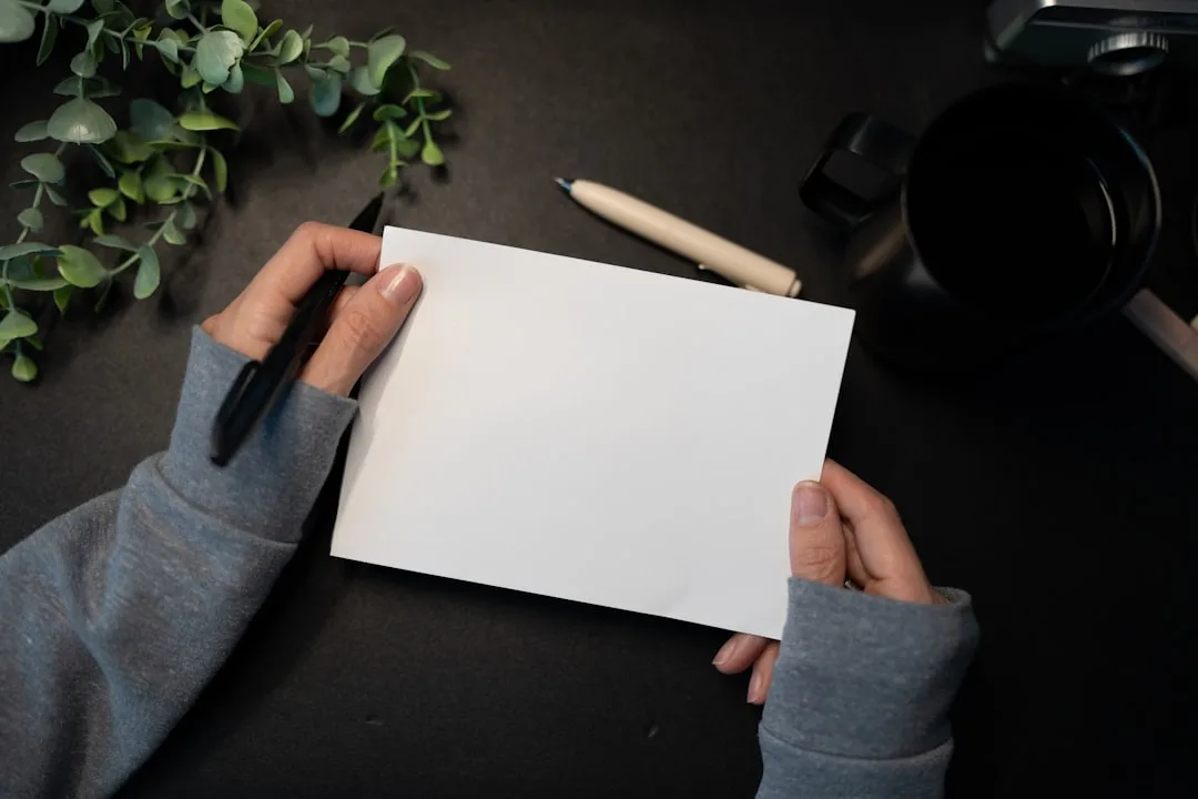 person sketching ideas on paper